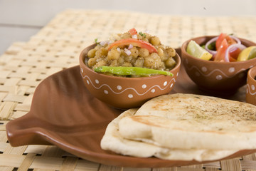 Matar kulcha or Dried yellow peas chaat with pan cooked bread