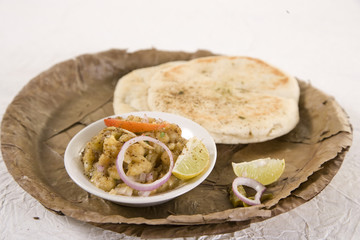 Matar kulcha or Dried yellow peas chaat with pan cooked bread