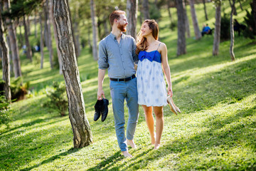 Fototapeta premium Romantic couple walking forest