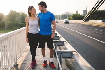 Beautiful sporty couple bonding after running