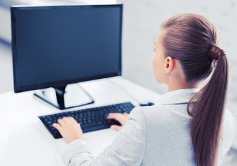businesswoman with computer in office