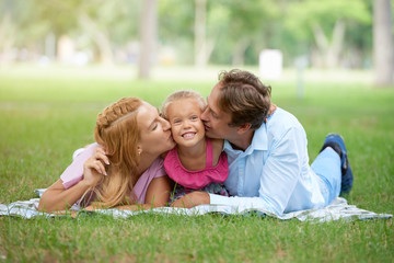 Fototapeta premium Kissing daughter