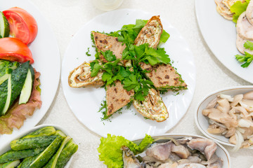 A fragrant liver cake, cut into pieces close-up.