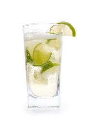 Mojito cocktail in glass. Transparent drink, lime, ice, foam and bubbles.