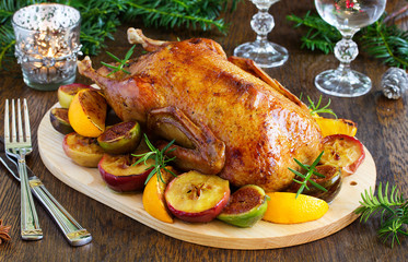 Festive Christmas duck baked with apples and figs.