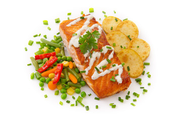 Salmon Steak with Vegetables and fried potatoes.