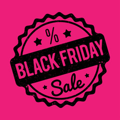 Black Friday rubber stamp black on a pink background.