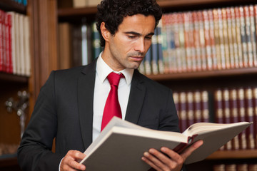 Lawyer reading a book
