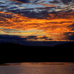 Sunrise over the water of  Seaton Wetlands in East Devon, England