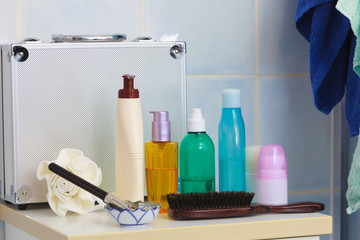 Toiletries in bathroom on shelf