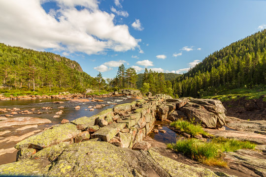 On the top of Rjukanfossen in the Norwegian forest in Tovdal. Norway