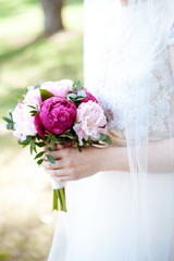 A bouquet of the bride in her hands.