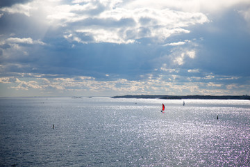 red sail in the sunlight