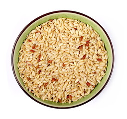 Integral, brown rice in bowl isolated on white background