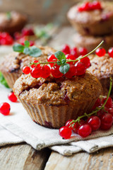 Fototapeta na wymiar Healthy muffins with red currants