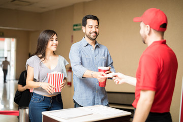 Couple on a date at the movie theater