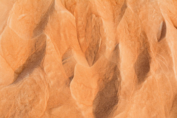 Dubai desert sand texture. Sand dunes at sunset.
