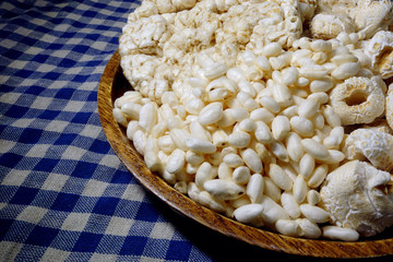 Korean traditional snacks Puffed rice in the wood plate.