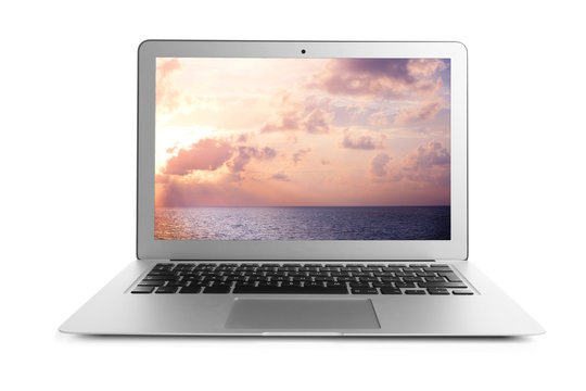 Laptop and wallpaper of landscape on screen, white background