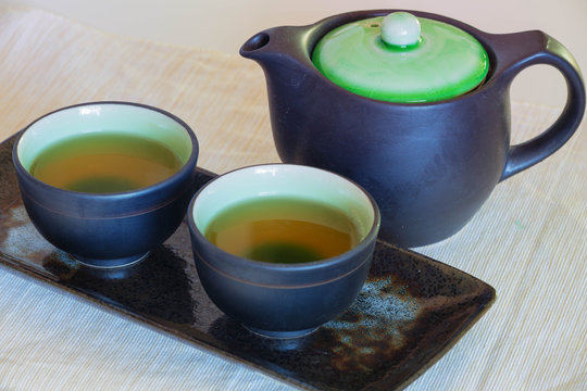 Brewed and healthy Japanese green tea served in traditional hohin and shiboridashi dishes