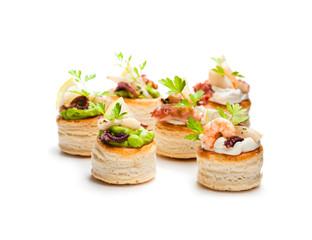 Vol-au-vents  puff pastry cases filled with salted squid and octopus