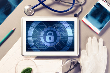 Web security and technology concept with tablet pc on table