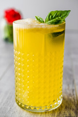Persian Saffron Milkshake with basil leaves.