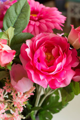 Colorful artificial flowers of the material as a permanent of the interior