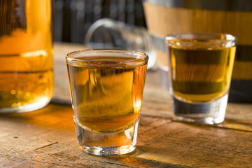 Alcoholic Brown Rum in a Shot Glass