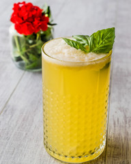 Persian Saffron Milkshake with basil leaves.