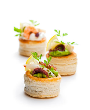 Vol-au-vents  puff pastry cases filled with salted squid and octopus