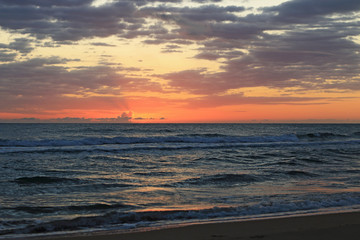 Naklejka na ściany i meble Sunrise on the beach