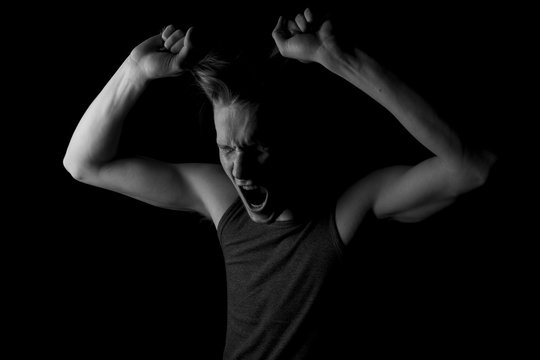A Young Man Pulling His Hair