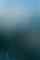 Blurred natural wet window fresh surface background, close up image