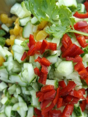 




Mexican food. Shredded ingredients for salsa. Cucumbers, corn and chili peppers