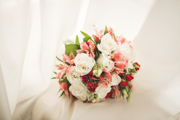 Wonderful luxury wedding bouquet of different flowers