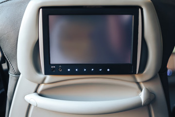 Long-distance international bus of the raised comfort with built in seat chair, a TV or a tablet where they can watch movies during road and listen to music, surf the Internet
