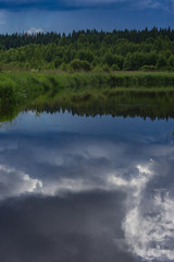 Fototapeta premium A wild river is approaching a thunderstorm