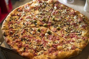 Tasty pizza texture from above