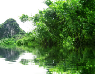 Fototapeta na wymiar Landscape with moutain and river, Trang An, Ninh Binh, Vietnam