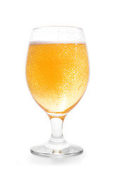 Golden beer with bubbles into glass