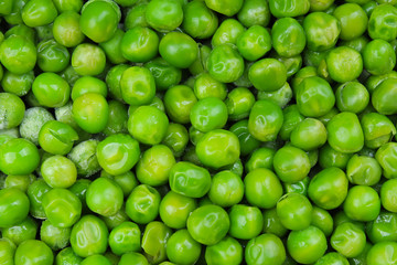 Frozen peas. Frozen green vegetable pea grains.