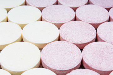 vitamine tablets fizzy closeup texture studio photo.