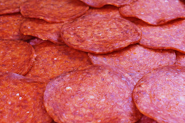 Sausages salami texture. Sausage background.