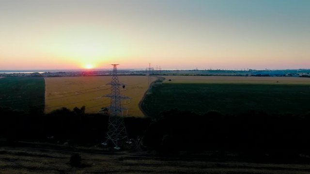 Electricity power station at a sunset