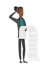 Young african accountant holding a long bill.