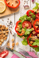 Caesar salad on rustic background