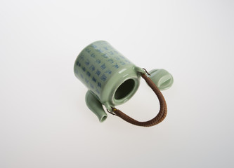 tea pot or ceramic teapot on background.