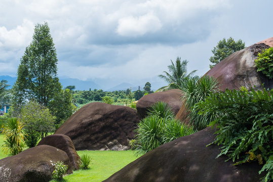 Big rocks and grass in the sky