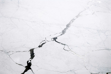 aerial view of floating ice on the ocean
